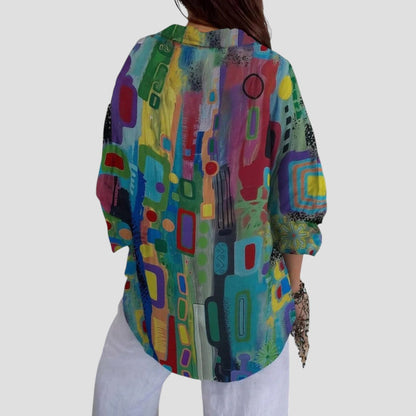 Dominique | Elegant geometric print blouse with modern breezy sophistication