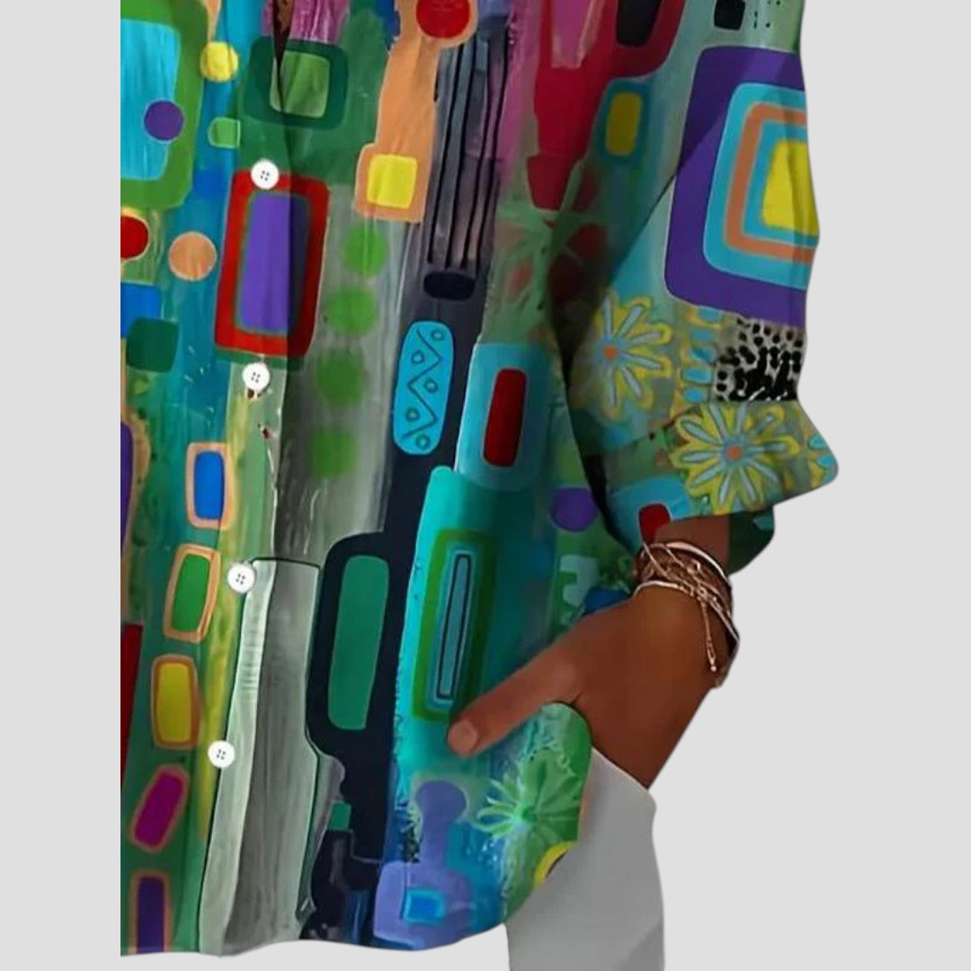 Dominique | Elegant geometric print blouse with modern breezy sophistication