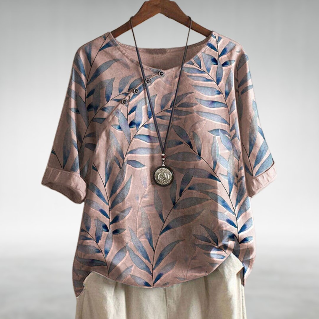 Simone | Chic blouse with playful asymmetric button and modern flair